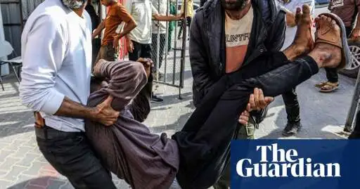 At least 27 Palestinians killed by Israeli fire at food point, Gaza officials say