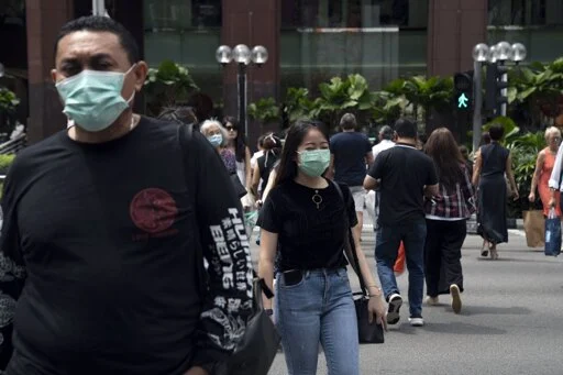 Covid cases spike in Hong Kong, Singapore as new wave spreads